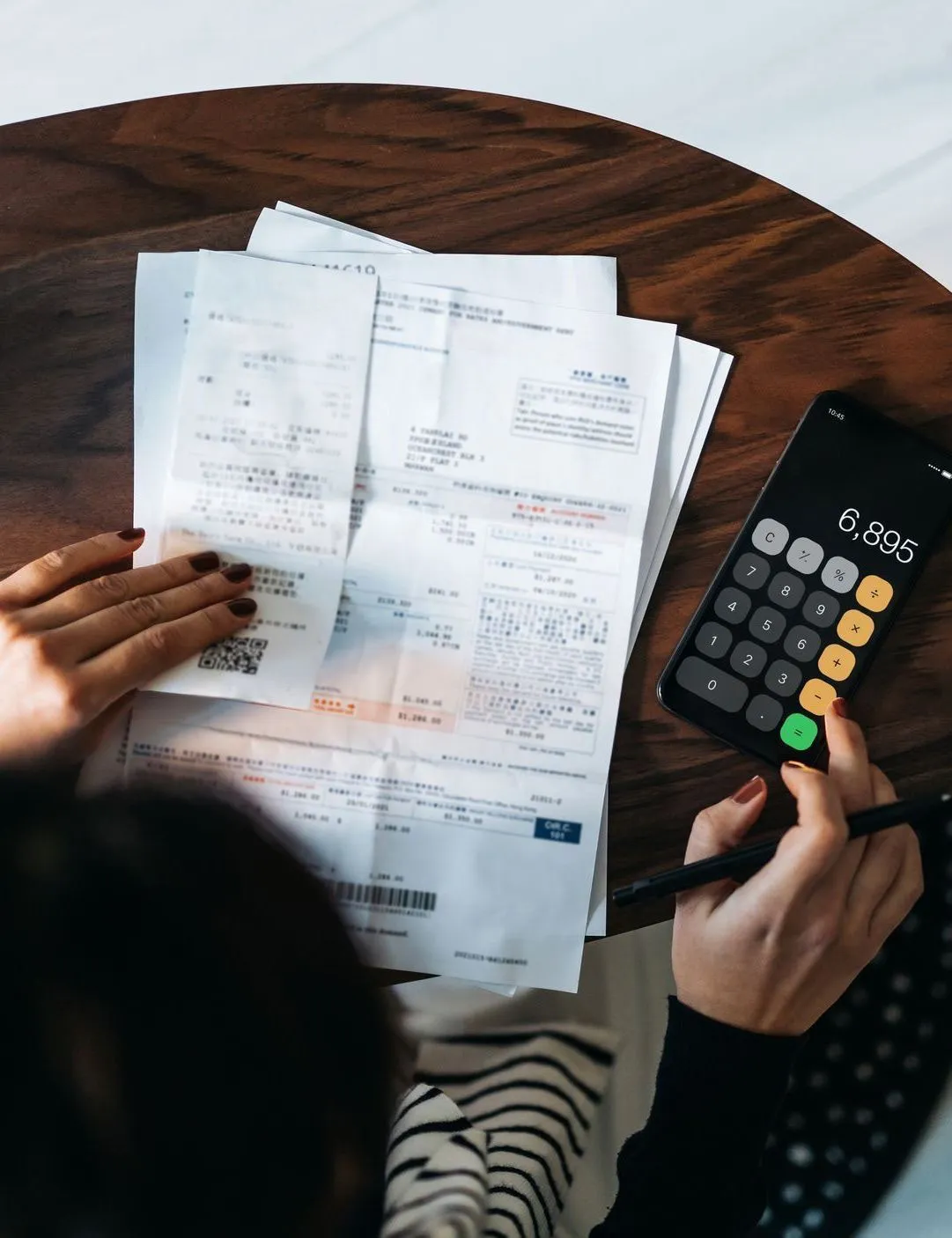 Receipts and calculator on a desk