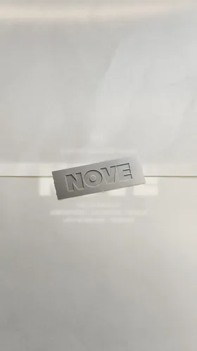 NOVE embossed brand detail